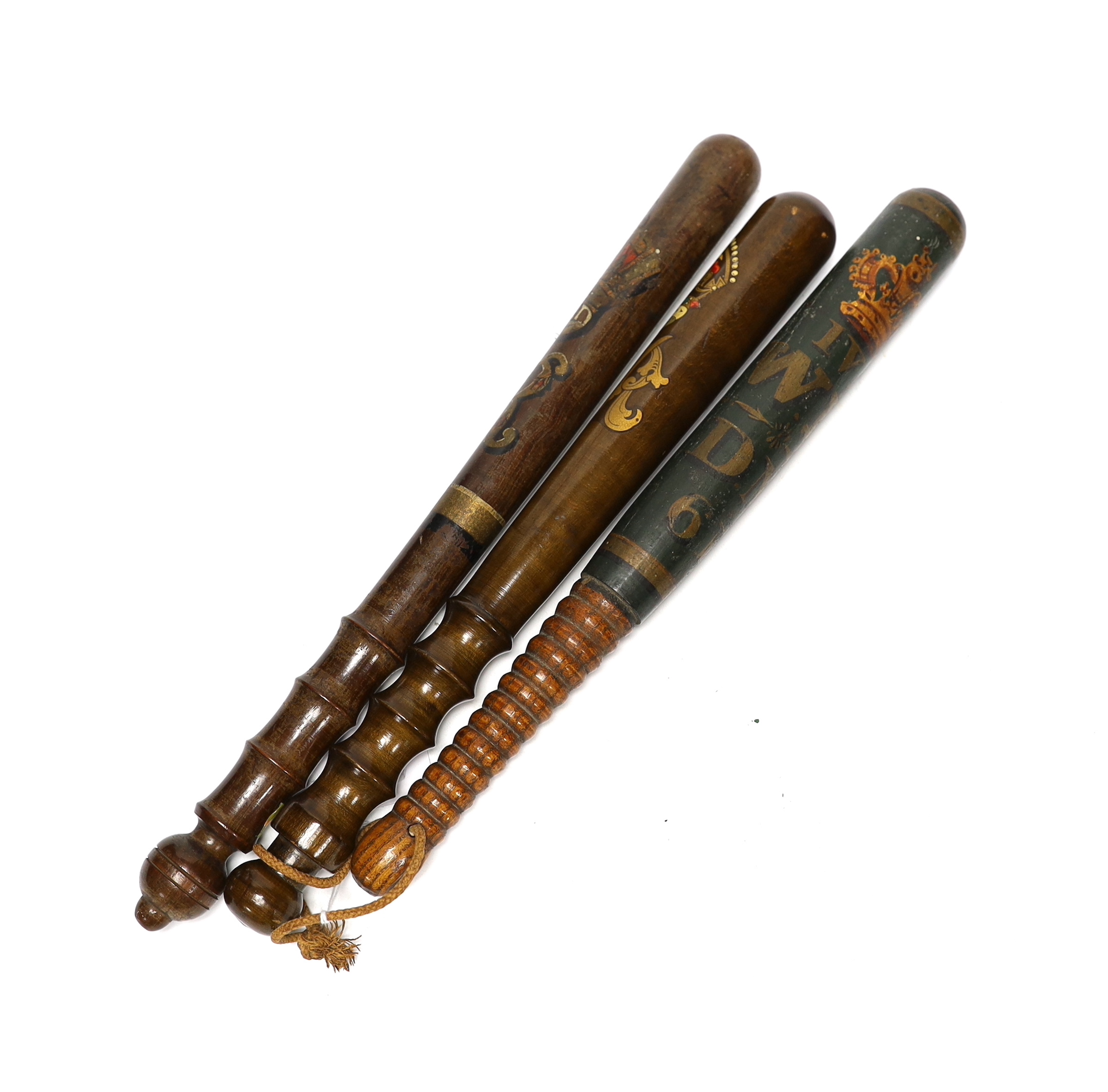 Three painted wooden truncheons: William IV, Victoria and George V, largest Victoria 42cm long